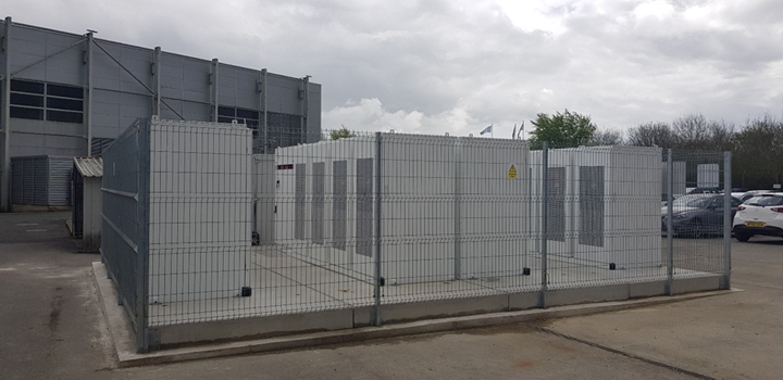 grey vented blocks fenced in